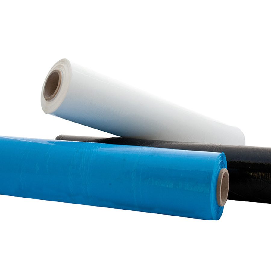 Trois rouleaux de film plastique : blanc, bleu et noir.